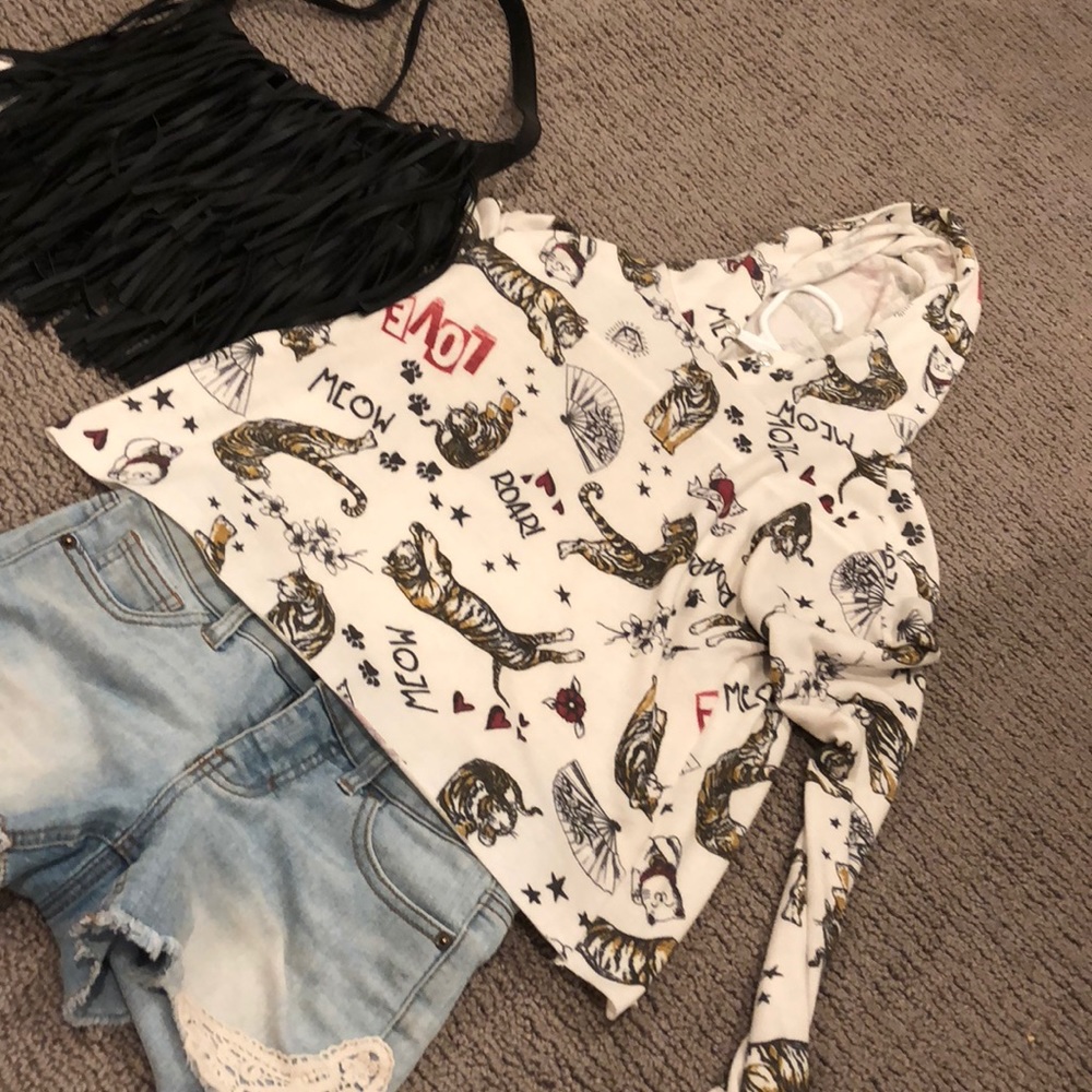 Tiger Hoodie w/ shorts and a leather purse.